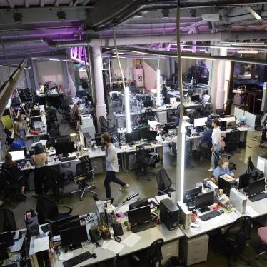 Journalists work in the news room of the independent Dozhd (Rain) television channel in Moscow, Russia.