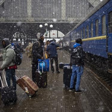 Nigerian students in Ukraine wait on a platform in Lviv railway station for a train to evacuate across the border, Sunday, February 27, 2022 in Lviv, west Ukraine.