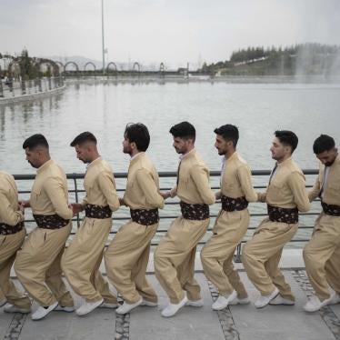 A group of Iranian-Kurds dance in a ceremony to mark Nowruz in Tehran, Iran, March 14, 2022.