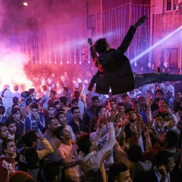 Youth dance to Mahraganat music at a wedding in Salam City, a suburb of Cairo, March 5, 2015.