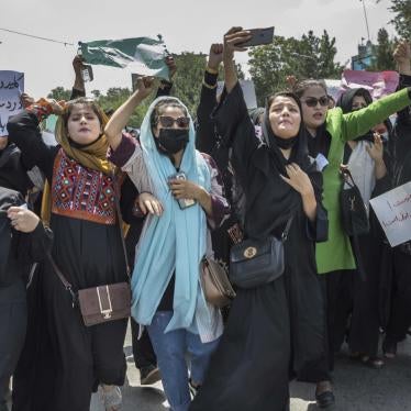 Afghan women demonstrate against violations of their rights in the center of Kabul, Afghanistan, August 13, 2022. 