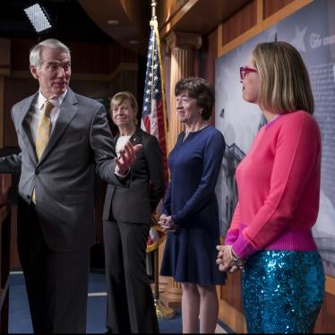 Senators talk with reporters following Senate passage of Respect for Marriage Act. 