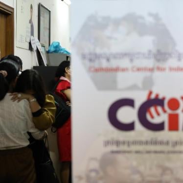 Voice of Democracy staff inside their office