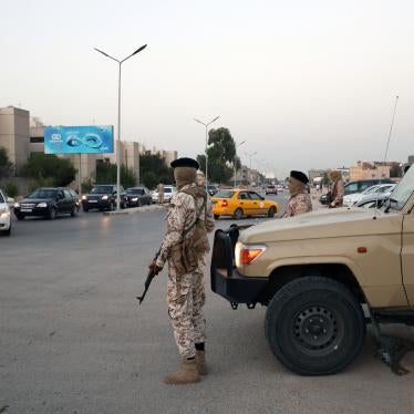 Members of Brigade 444, an armed group linked with the Tripoli Army Chief of Staff, patrol streets of Salaheddin in the southern suburbs of Tripoli.