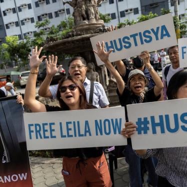 Supporters of former senator Leila de Lima outside the Hall of Justice in Muntinlupa City, Philippines, May 12, 2023.