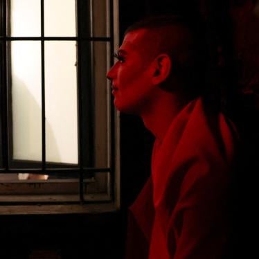 The drag artist known as Latiza Bombe hides on the terrace of a bar after it was attacked by a group of conservative Christians who identify as the “Soldiers of God,” in Beirut, Lebanon, August 23, 2023.