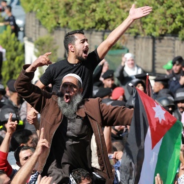 People protest near the Israeli Embassy in Amman on October 18, 2023, as they demonstrate against the killing of hundreds of Palestinians following a strike on a hospital in the Gaza Strip.