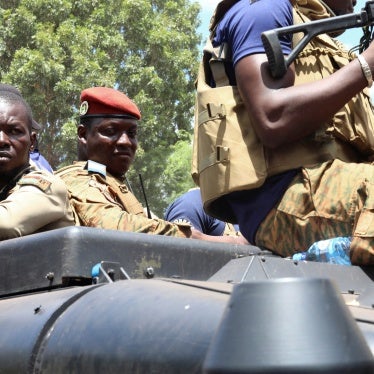 Burkina Faso's president, Capt. Ibrahim Traore (center), in an armored vehicle in Ouagadougou, October 2, 2022.
