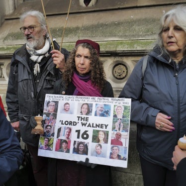Supporters of Just Stop Oil, Defend Our Juries and other groups gather outside the Royal Courts of Justice in London to protest during the appeal hearing for 16 activists who are collectively serving 41 years in prison for peaceful resistance, January 29, 2025.