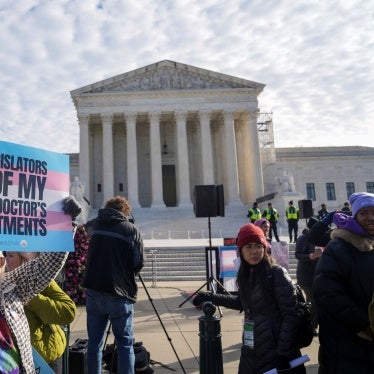 Supporters of gender-affirming care protest outside the Supreme Court in Washington, DC, on December 4, 2024. (c) 2024 Photo by Andrew Leyden/NurPhoto via AP