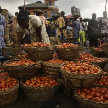 Vendors display tomatoes for sell at Mile 12 market in Lagos, Nigeria, July 7, 2021.
