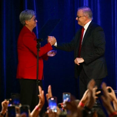 Australia's Foreign Minister Penny Wong (L) with Australia's Prime Minister Anthony Albanese after he won the general election in Sydney, May 3, 2025.