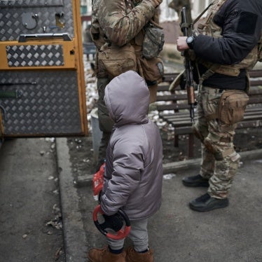 Civilians, including two young children, are evacuated from a shelling zone, Pokrovsk, Ukraine, February 14, 2025.