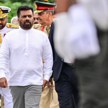 Sri Lankan President Anura Kumara Dissanayake (C) during a ceremony to commemorate the 16th anniversary of National War Heroes Day, marking the end of the country’s civil war, in Colombo,  May 19, 2025.