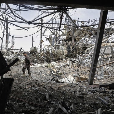 A Yemeni officer inspects the damage following Israeli airstrikes on Sanaa International Airport in Sanaa, Yemen, May 7, 2025.
