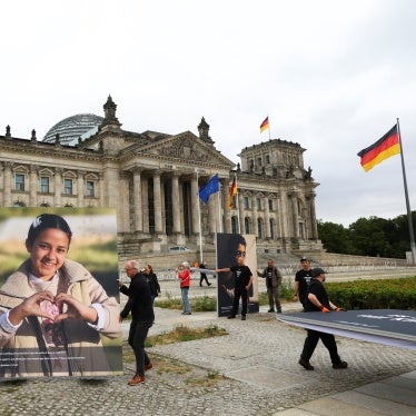 Activists set up pictures of children from Gaza in front of the Reichstag building during a protest calling for greater commitment of the German government to the children of Gaza and the defense of international law, in Berlin, Germany, July 9, 2025.