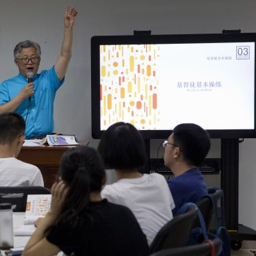 Jin Minri leads a class on the basics of Christian beliefs at the Zion Church in Beijing, China, August 4, 2018. 