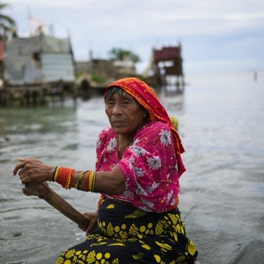 A person from the Guna Indigenous community along the shore of Gardi Sugdub Island, off Panama's Caribbean coast.