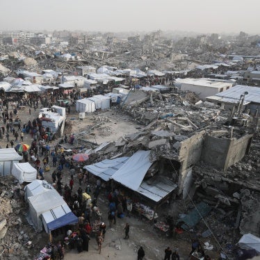 Palestinians shop at a market set up among rubble in the Jabalia Refugee Camp in northern Gaza during the temporary ceasefire between Israel and Hamas in early 2025, on March 5, 2025. 