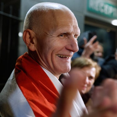 Nobel Peace Prize laureate Ales Bialiatski, one of released Belarusian prisoners, smiles as he arrives at the U.S. Embassy in Vilnius, Lithuania, on December 13, 2025.