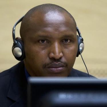Congolese warlord Bosco Ntaganda looks on during his first appearance before judges at the International Criminal Court in the Hague March 26, 2013.
