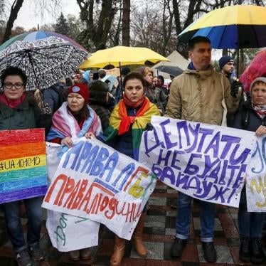 Gay rights activists attend a rally outside the parliament building in Kiev, Ukraine, November 10, 2015.