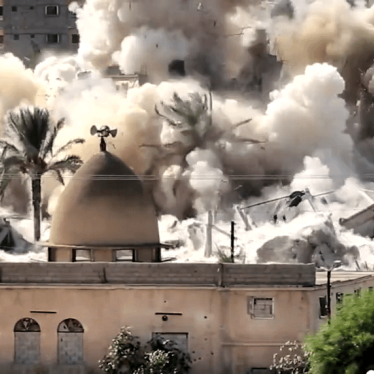 The Egyptian military destroys a building in Rafah, on the border with the Gaza Strip, during forced evictions between October 20-31, 2014. 