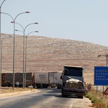 Commercial Turkish trucks wait to cross to Syria near the Cilvegozu border gate, located opposite the Syrian commercial crossing point Bab al-Hawa in Reyhanli, Hatay province, Turkey, September 16, 2016.