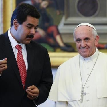 Pope Francis poses with Venezuela's President Nicolas Maduro during a meeting at the Vatican on June 17, 2013. 