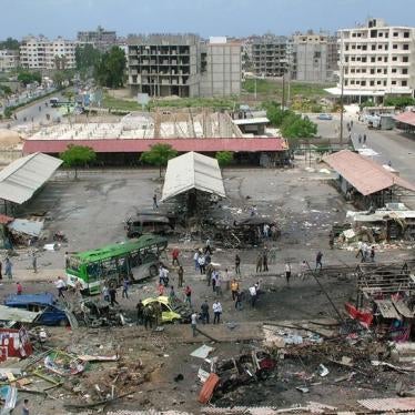 People inspect the damage after explosions hit the Syrian city of Tartous, in this handout picture provided by the Syrian Arab News Agency on May 23, 2016. 