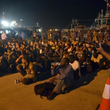 A group of migrants held by Egyptian armed forces at a port in Egypt*, in June 2016.