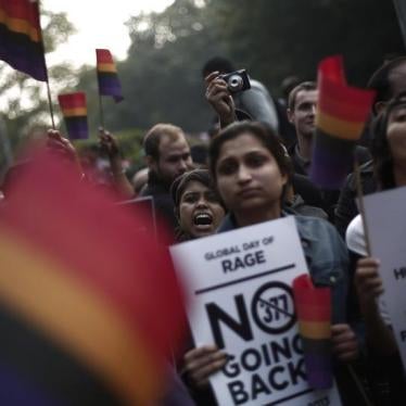 Gay rights activists hold placards as they shout slogans during a protest against a verdict by the Supreme Court in New Delhi December 15, 2013. 