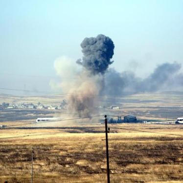 Smoke from U.S.-led coalition airstrikes against ISIS in a village east of Mosul, Iraq, May 2016.