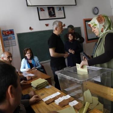 A woman casts her ballot at a polling station in Ankara during the referendum, April 16, 2017. 
