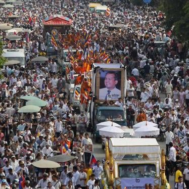 Tens of thousands of people attend a funeral procession in Phnom Penh for Kem Ley, a frequent critic of the government, who was shot and killed on July 10, 2016. 