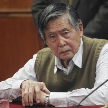 Peru's former President Alberto Fujimori listens to the judge's verdict about his sentence in prison, in Lima October 29, 2013.