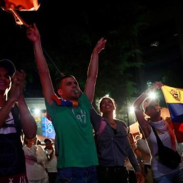 Opposition supporters react while waiting for results of the unofficial plebiscite against President Nicolas Maduro's government and his plan to rewrite the constitution, in Caracas, Venezuela July 16