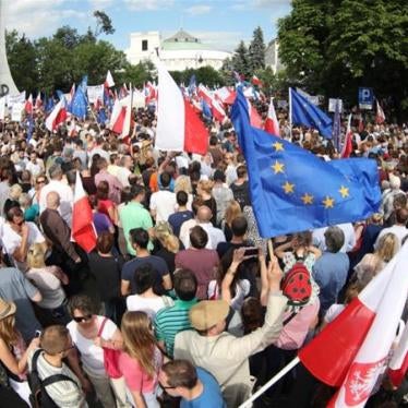 Protesters gather in front of the Parliament building during an opposition protest in Warsaw, Poland, July 16, 2017