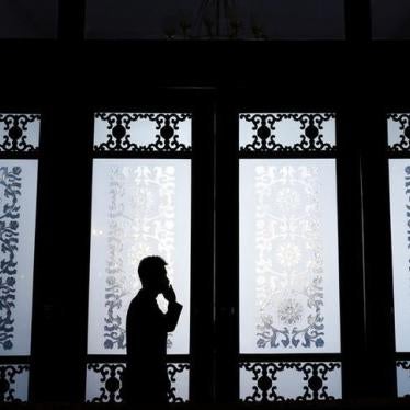 A man talks on the phone in Beijing, China, March 2, 2017.