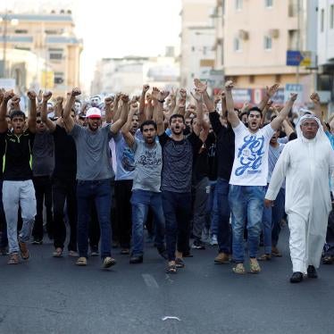 Mourners shouting anti-government slogans during the funeral procession of Hassan Al Hayki, who was arrested in connection with a car bombing. Al Hayki died while in detention in Manama, August 2, 2016. 