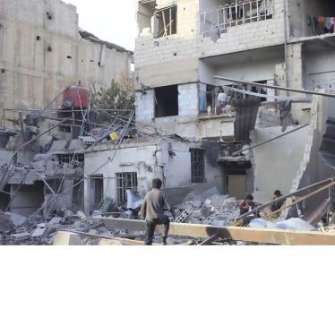 Children in the rubble of damaged buildings in the eastern Damascus suburb of Ghouta, Syria. 