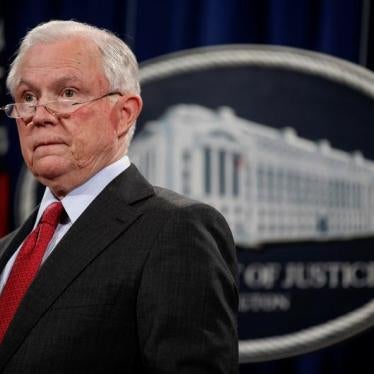 U.S. Attorney General Jeff Sessions stands during a news conference to discuss "efforts to reduce violent crime" at the Department of Justice in Washington, U.S., December 15, 2017.