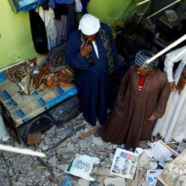 People check the damage created by debris, after ballistic missiles fired by Yemen's Houthi militia, fell at a house in Riyadh, Saudi Arabia, March 26, 2018. © 2018 Reuters