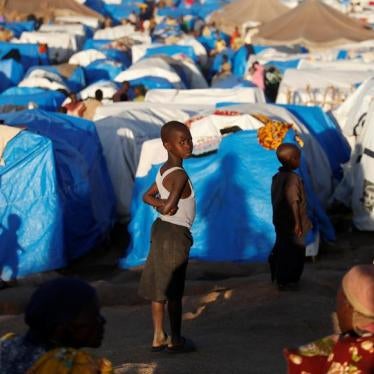 A girl stands in an Internally Displaced Camp in Bunia, Ituri province, eastern Democratic Republic of Congo, April 9, 2018. 
