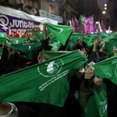 Demonstrators hold up green handkerchiefs, which symbolize the abortion rights movement, during a demonstration in favor of legalizing abortion outside the Congress in Buenos Aires, Argentina, May 31, 2018.