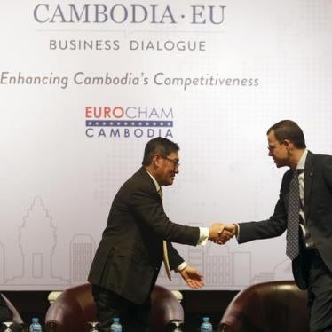 Cambodia’s secretary general for development Sok Chenda Sophea greets Emmanuel Menanteau of EuroCham during the Cambodia-EU business dialogue in Phnom Penh, March 28, 2016. 