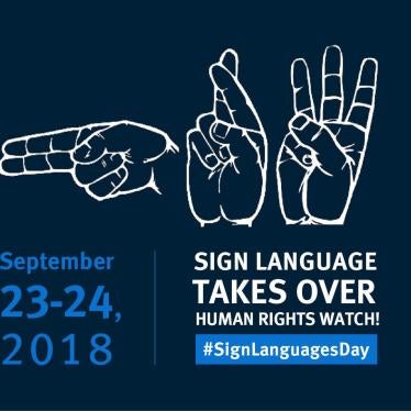 White outline of hands signing International Sign Language.