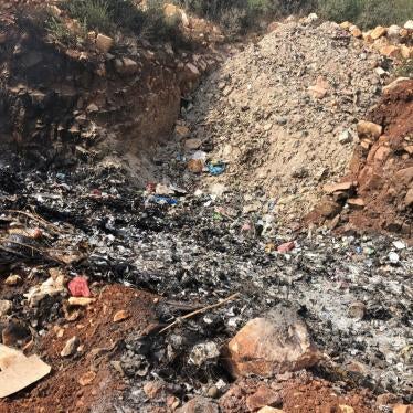 Smoke rising from the smoldering dump at Qabrikha, October 11, 2018, Qabrikha, Lebanon.