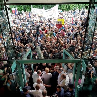 Supreme Court President Malgorzata Gersdorf addresses supporters and the media before entering the Supreme Court building in Warsaw, Poland, July 4, 2018.