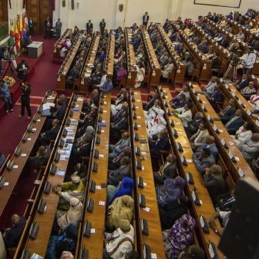 Abiy Ahmed, left, the newly elected chair of the Ethiopian Peoples' Revolutionary Democratic Front (EPRDF) addresses Ethiopian lawmakers after he was sworn in as the country's Prime Minister, Monday, April 2, 2018.
